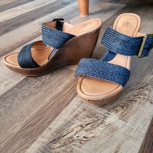 Brown and black platform sandals, size 10.